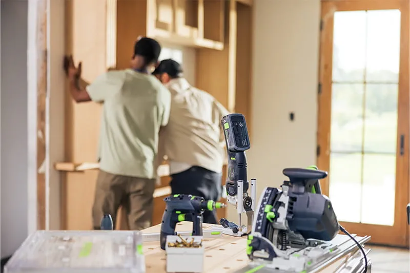 Cabinet Makers with Festool Tools on workbench